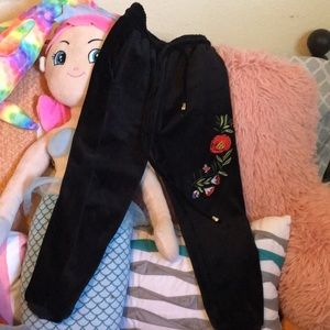 Black velvet jogger with flower design